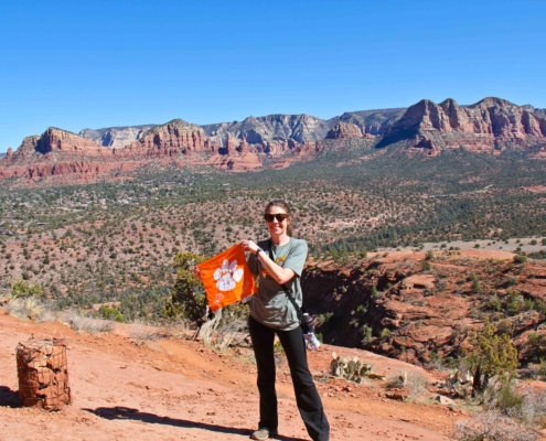 Arizona: Jenny Litzenberger \u201911 planned an extensive hiking and driving trip to Colorado, Utah and Arizona at the end of February 2021. \u201cThis picture was taken in Sedona, Arizona on the Cathedral Rock Trail,\u201d she wrote. \u201cIt is only listed at 0.7 miles, but it is extremely steep and difficult. There are \u2018cairns\u2019 throughout to guide you along the trail, since it is sometimes difficult to see a path when you are hiking on rock faces. A cairn is the basket of rocks in the picture, but they may also be in a stacked, tower-like rock structure.\u201d